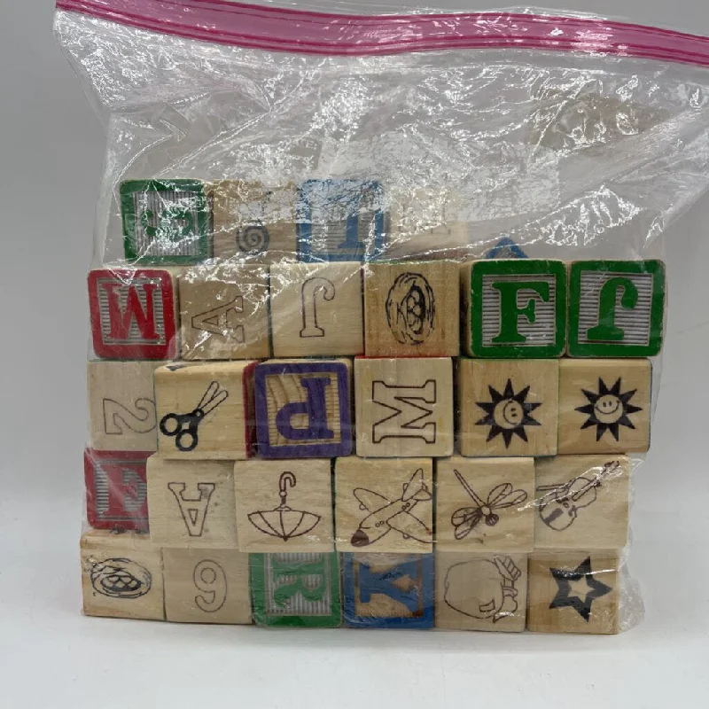 beautiful and detailed wooden toys that inspire creativity                   Bag of Assorted Wooden Alphabet Blocks