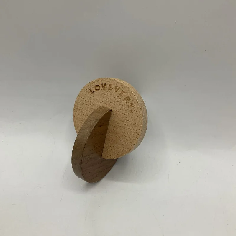 robust and engaging wooden toys for kids                   Lovevery Wooden Coin Hand Toy