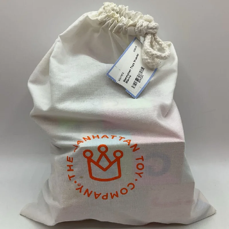 safe and child-appropriate wooden toys for different stages of development                   Manhattan Toys Wooden Blocks