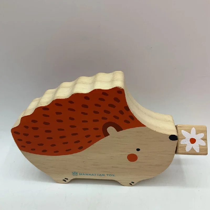 intricately carved wooden toys                   Manhattan Toys Wooden Hedgehog