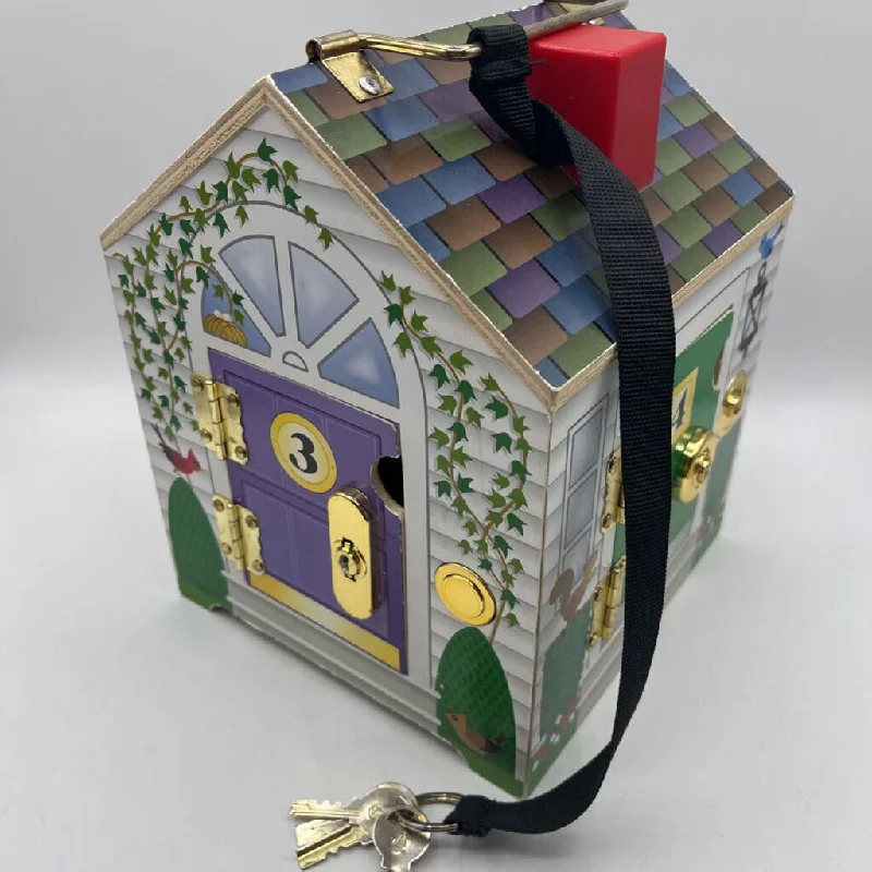 sturdy and safe wooden toys                 Melissa & Doug Take-Along Wooden Doorbell Dollhouse