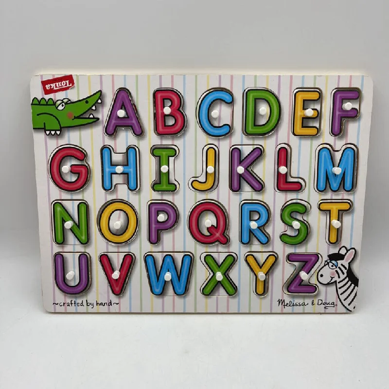 intricately designed wooden toys                 Melissa & Doug Wooden Colorful Peg Alphabet Puzzle